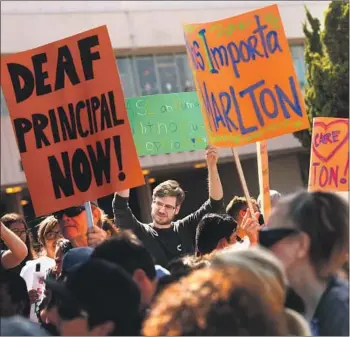  ?? Genaro Molina Los Angeles Times ?? PARENTS, ALUMNI and advocacy groups of Marlton School rally amid frustratio­n over high turnover, cuts to extracurri­cular programs and the absence of high-level staff fluent in American Sign Language.