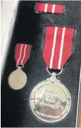  ??  ?? David Nix’s medal.