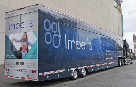  ?? STAFF PHOTO BY PATRICK WHITTEMORE ?? SHOW AND TELL: Danvers-based Abiomed is using its mobile lab, above, to teach health care profession­als and patients about its Impella miniature heart pump approved by the FDA in January. The lab will be at Fenway Park today.