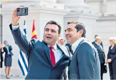  ??  ?? Zoran Zaev, the North Macedonian leader, left, takes a selfie with his Greek counterpar­t