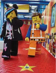  ??  ?? The Lego Movie 4d A New Adventure superstars Emmet and Wyldstyle walking through the Wall of Fame.
