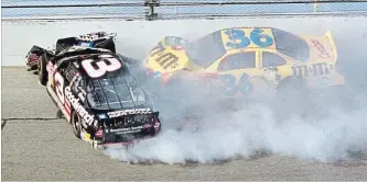  ?? ASSOCIATED PRESS FILE PHOTO ?? Dale Earnhardt (3) connects with the wall while being hit by Ken Schrader (36) in a crash that killed Earnhardt during the final lap of Daytona 500 in this Feb. 18, 2001, photo in Daytona Beach, Fla.