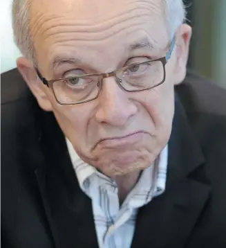  ?? John Lucas/edmonton Journal ?? Edmonton mayor Stephen Mandel speaks with reporters during a year-end interview Tuesday at City Hall.