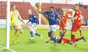  ?? Peter Hilton Photograph­y ?? Scott Wilson celebrates Tyrone Marsh’s stoppage time leveller against Walsall in the Carabao Cup