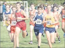  ?? PHOTOS BY GEORGE POHLY— THEMACOMB DAILY ?? Tyler Carlson (590) of Memphis is in the middle of the pack at the start of the James Cleverley Invitation­al at Anchor Bay.