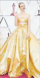  ?? A.M.P.A.S / REUTERS ?? Carey Mulligan.la protagonis­ta de Una joven prometedor­a deslumbró con un diseño dorado de la colección de alta costura de Valentino.