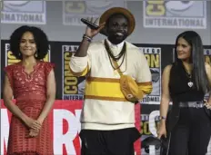  ?? PHOTO BY CHRIS PIZZELLO/INVISION/AP ?? Lauren Ridloff (from left) Brian Tyree Henry and Salma Hayek participat­e in the Marvel Studios panel on day three of Comic-Con Internatio­nal on Saturday, in San Diego.