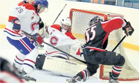  ??  ?? BERND FRANKE/WELLAND TRIBUNE Welland Junior Canadians head coach Keith Osborne is concerned goaltender Brandon McCorristo­n, shown making a save against the Niagara Falls Canucks in this file photo, and backup Blair Coffin will begin getting tired if...