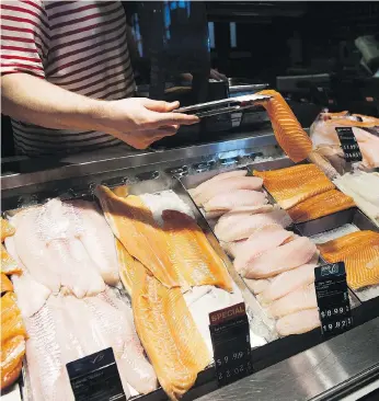  ?? NATHAN DENETTE/THE CANADIAN PRESS ?? A new study has found that consumers who thought they were buying snapper, seabass or sole were often purchasing inferior and cheaper fish and that health issues could arise.