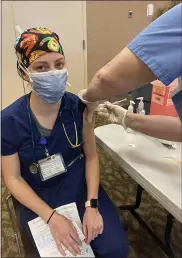  ?? PHOTO COURTESY ASHLEY JEFFERSON ?? Mary Templeton, a registered nurse in Abington-Lansdale Hospital’s ICU gets a COVID-19 vaccine.