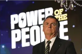  ?? REBECCA BLACKWELL — THE ASSOCIATED PRESS ?? Brazil’s former President Jair Bolsonaro speaks at an event hosted by conservati­ve group Turning Point USA at Trump National Doral Miami in Doral, Fla., on Friday.