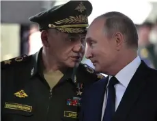  ?? — AFP file photo ?? Putin (right) and Shoigu visit the military Patriot Park in Kubinka, outside Moscow, on Sept 19, 2018.