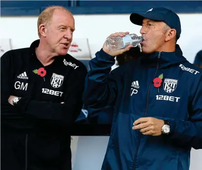  ?? REX SHUTTERSTO­CK ?? Happier times: Gary Megson (left) with sacked Tony Pulis in the West Brom dugout