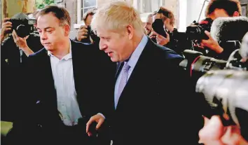  ?? AP ?? British Conservati­ve party leadership contender Boris Johnson leaves his home in south London to attend a party meeting yesterday.