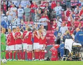  ?? AFP ?? Paramedics attend to Denmark midfielder Christian Eriksen (not seen) after he collapsed during the Euro 2020 match against Finland at the Parken Stadium in Copenhagen.