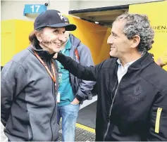  ??  ?? Former drivers Emerson Fittipaldi and Alain Prost during practice. — Reuters photo