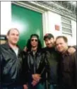  ?? SUBMITTED PHOTO ?? Robert Stewart (far left) Slash, Chris Santoro and Vince Graziano after a Velvet Revolver concert at the Sovereign Bank Center in Trenton in 2007.