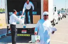  ??  ?? Far right: Sultan Al Shehi of Emirates Red Crescent at one of the charity projects.