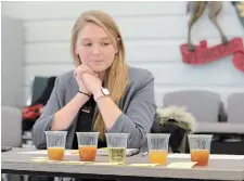  ?? ?? Judge Lisa Herrewynen of the Norfolk Fruit Growers' Associatio­n said the contest is a good way to promote the apple industry and give feedback to cider makers.