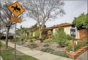  ?? Kent Nishimura Los Angeles Times ?? JANUARY marked the fifth consecutiv­e month home sales in Southern California rose by double digits.