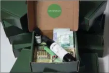  ?? ELIJAH NOUVELAGE — THE ASSOCIATED PRESS ?? In this photo, a sample Greenbox filled with CBD and hemp-based products is shown on a table in Atlanta, Ga.