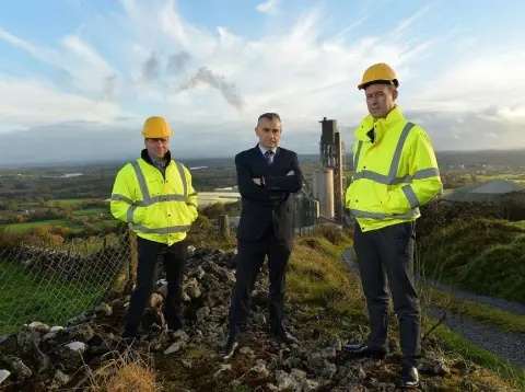  ??  ?? UNDER ATTACK: From left, Kevin Lunney, chief operations officer, Liam McCaffrey, chief executive officer, and Dara O’Reilly, chief finance officer of Quinn Industrial Holdings in Derrylin, Co Fermanagh. Photo: Oliver McVeigh