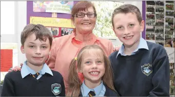  ??  ?? Shane, Emma and Adam with their Grandmothe­r Angela Bellew