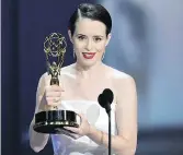  ?? CHRIS PIZZELLO/THE ASSOCIATED PRESS ?? Claire Foy accepts the award for her role in The Crown.