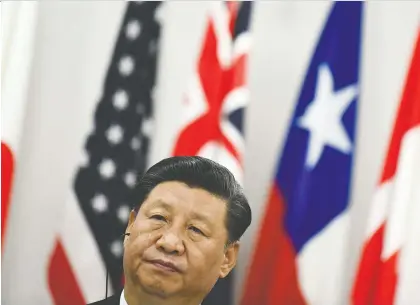  ?? BRENDAN SMIALOWSKI/GETTY IMAGES ?? China’s President Xi Jinping, who has declared himself “president for life,” faces enormous trade pressures from the U.S. as well as embarrassm­ent on the global stage over protests in Hong Kong in reaction to Beijing’s attempts to erode political freedoms.