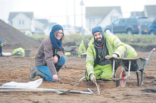  ?? ?? INTO THE PAST: Claire Herbert, Angus archaeolog­ical adviser, and team member Riccardo Caravello at the site on Balmachie Road, Carnoustie.