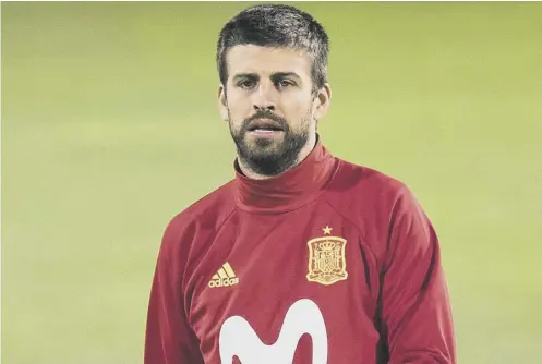  ??  ?? 0 Gerard Pique, a vocal supporter of Catalan independen­ce, was harassed by fans when he reported for Spain’s training camp in Madrid.