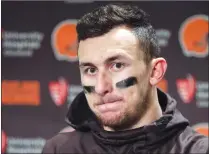  ?? Canadian Press photo ?? In this Dec. 20, 2015, file photo, Cleveland Browns quarterbac­k Johnny Manziel speaks with media members. The Hamilton Tiger-Cats have worked out Manziel but aren’t close to signing the former Heisman Trophy winner.