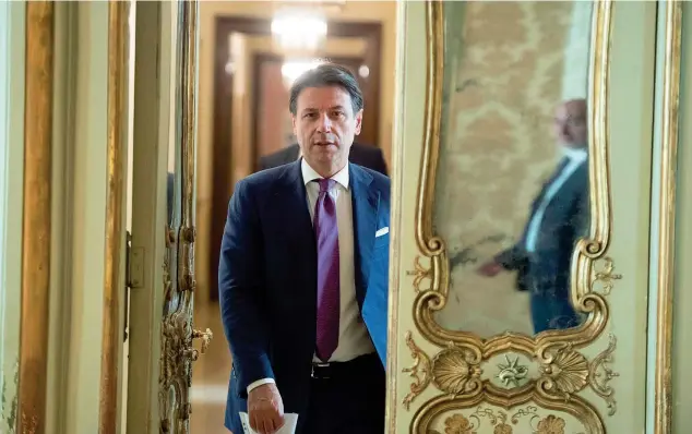  ?? (Lapresse) ?? Al lavoro Il presidente del Consiglio Giuseppe Conte, 55 anni, ieri a Palazzo Chigi. Dopo aver guidato per 14 mesi il governo gialloverd­e, dal 5 settembre è a capo di un esecutivo M5s-pd-italia viva-leu