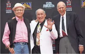  ?? NICK UT/AP ?? Carl Reiner, right, joined friends Norman Lear, left, and Mel Brooks for Brooks’ 2014 hand and footprint ceremony at TCL Chinese Theater in Hollywood. Reiner and Brooks still get together daily, Reiner says.