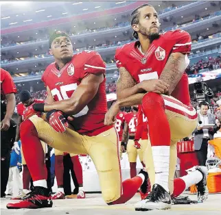  ?? MARCIO JOSE SANCHEZ/THE ASSOCIATED PRESS FILES ?? In the wake of his kneeling protest during the national anthem last season, former 49ers QB Colin Kaepernick, right, has been unable to land a job anywhere in the NFL.