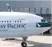  ?? — AFP ?? Cathay Pacific Airways aircraft at Toulouse airport in France.
