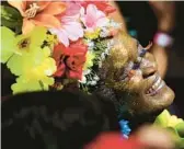  ?? BUDA MENDES/GETTY ?? A reveler attends the annual block party known as Ceu na Terra, or Heaven on Earth, on the second day of Carnival on Saturday in Rio de Janeiro.