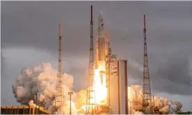  ?? Photograph: Jm Guillon/ESA/EPA ?? An Ariane 5 rocket with the James Webb space telescope on board launches from the Guiana Space Centre in Kourou, French Guiana.