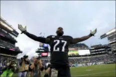  ??  ?? Eagles safety Malcolm Jenkins, celebratin­g after a win over Denver last season, is hoping that moving past last year’s Super Bowl championsh­ip will help avoid complacenc­y on the part of the 2018 Eagles.