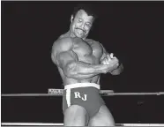  ?? WWE, INC. VIA AP ?? In this undated photo provided by WWE Inc., Rocky “Soul Man” Johnson poses in the ring. Johnson, a WWE Hall of Fame wrestler who became better known as the father of actor Dwayne “The Rock” Johnson, died Wednesday. He was 75.