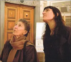  ?? Zeitgeist Films ?? FILMMAKER Astra Taylor, right, in Siena, Italy, for a visit with researcher­activist-educator Silvia Federici, part of a running commentary in the film.