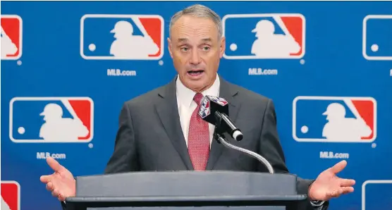  ?? CHARLES REX ARBOGAST/THE ASSOCIATED PRESS ?? MLB commission­er Rob Manfred is open to legalized sports betting, with regulation­s in place to fight potential corruption.