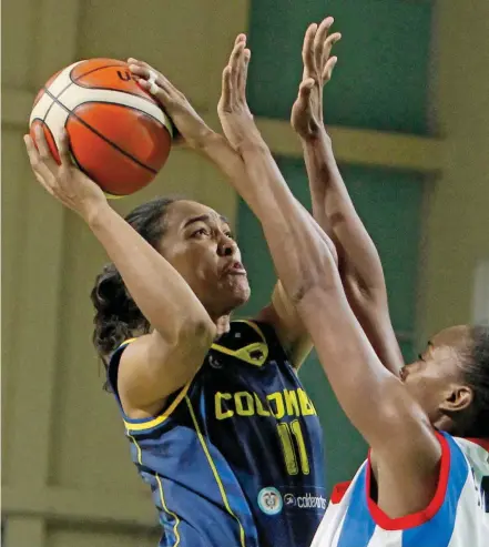  ??  ?? Yanet María Arias, líder del histórico triunfo de Colombia ante Cuba 67-65. Tercer oro del ciclo olímpico