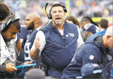  ?? James Kenney / Associated Press ?? Titans coach Mike Vrabel won three Super Bowl rings playing linebacker and goal-line pass threat for Bill Belichick in New England. Now the rookie head coach gets his first crack at his former coach on Sunday.