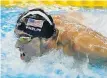  ?? THE ASSOCIATED PRESS ?? Michael Phelps finished second in his 200-metre butterfly semifinal Monday, advancing to the final.