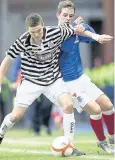 ??  ?? SPIDERS MAN kid Spittal battles with Gers’ Templeton
