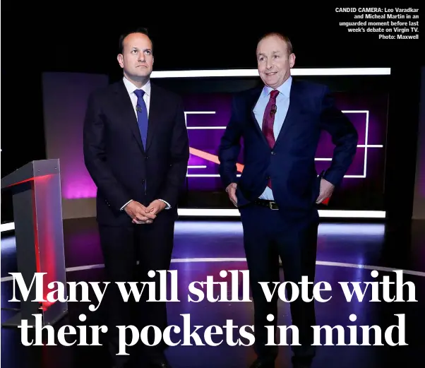  ??  ?? CANDID CAMERA: Leo Varadkar and Micheal Martin in an unguarded moment before last week’s debate on Virgin TV. Photo: Maxwell