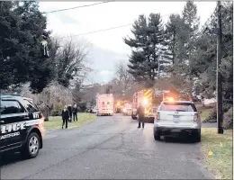  ?? KATHLEEN MCWILLIAMS/HARTFORD COURANT ?? West Hartford police, fire and ambulance services responded to Stoner Drive in West Hartford following a reported stabbing Monday.