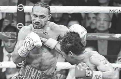  ?? Getty Images file photo ?? Keith Thurman, left, is coming off a split-decision loss to Manny Pacquiao in July 2019. He’ll face San Antonio welterweig­ht Mario Barrios on Feb. 5. “We both have to prove ourselves,” he said.