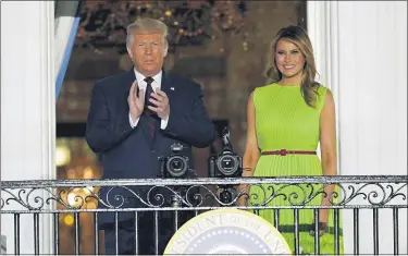  ?? THE ASSOCIATED PRESS ?? President Donald Trump and first lady Melania Trump arrive on South Lawn of the White House on the fourth day of the Republican National Convention, Thursday, Aug. 27, in Washington.